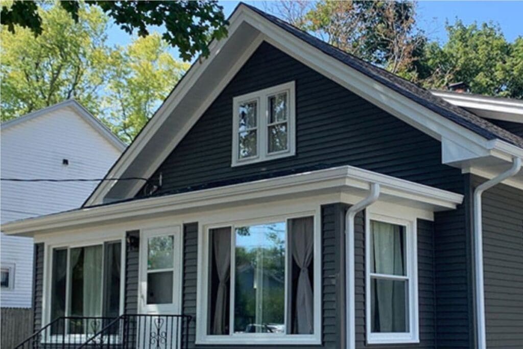 stunning exterior remodeling job on a dark blue home in chicago, IL.