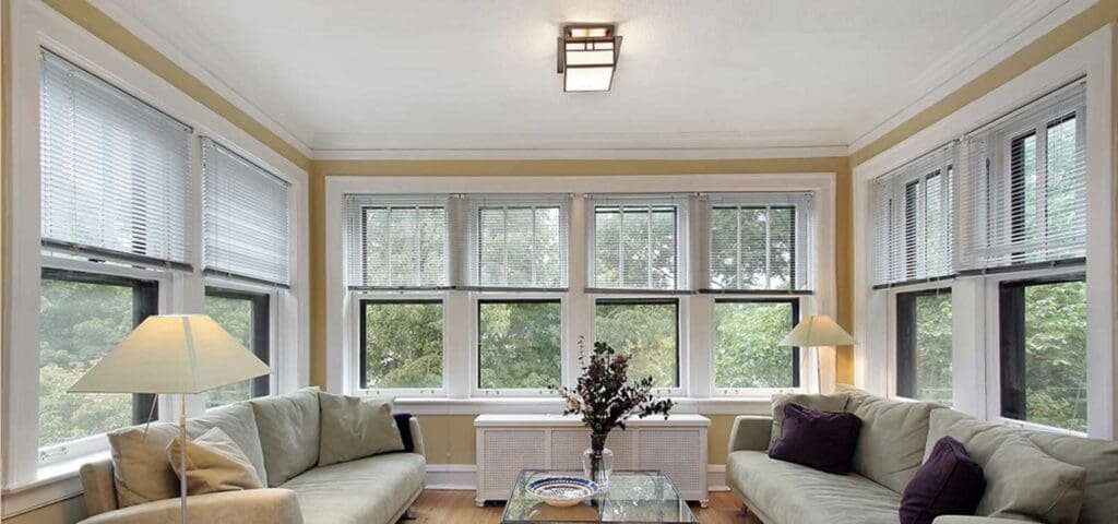 Bright living room with large windows letting in natural light
